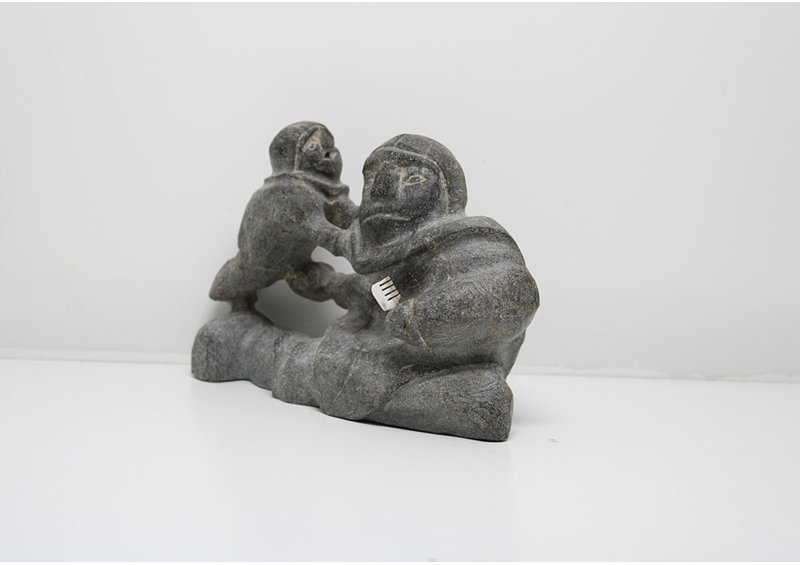 24283 Mother combing child by Thomas Akilak