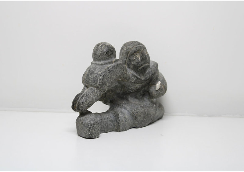 24283 Mother combing child by Thomas Akilak