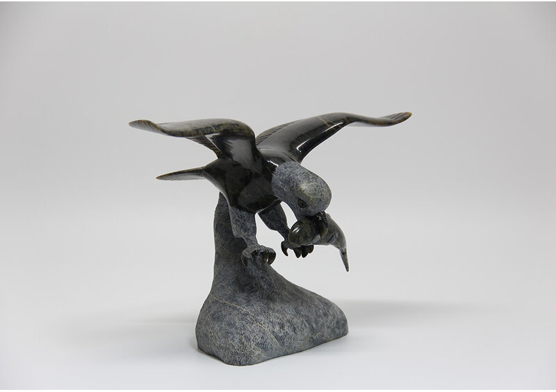 22152 Eagle hunting fish by Pitseolak Qimirpik