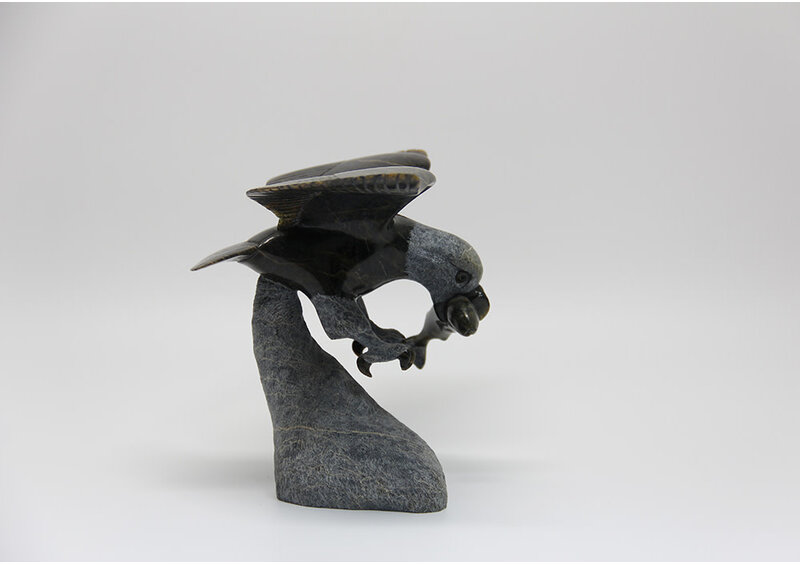 22152 Eagle hunting fish by Pitseolak Qimirpik