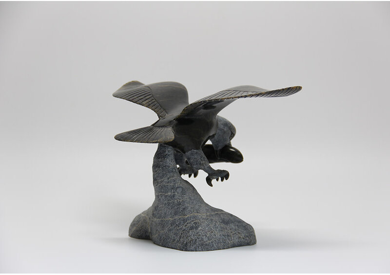 22152 Eagle hunting fish by Pitseolak Qimirpik