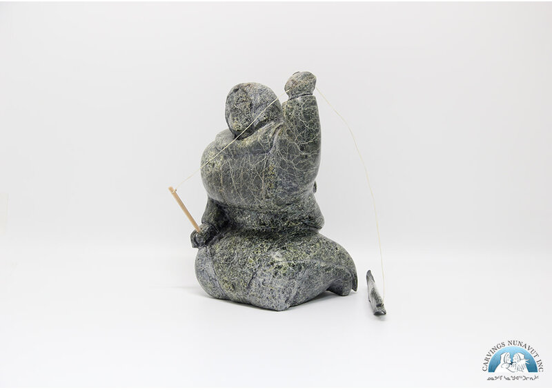 7924 Woman fishing by Archie Ishulutak