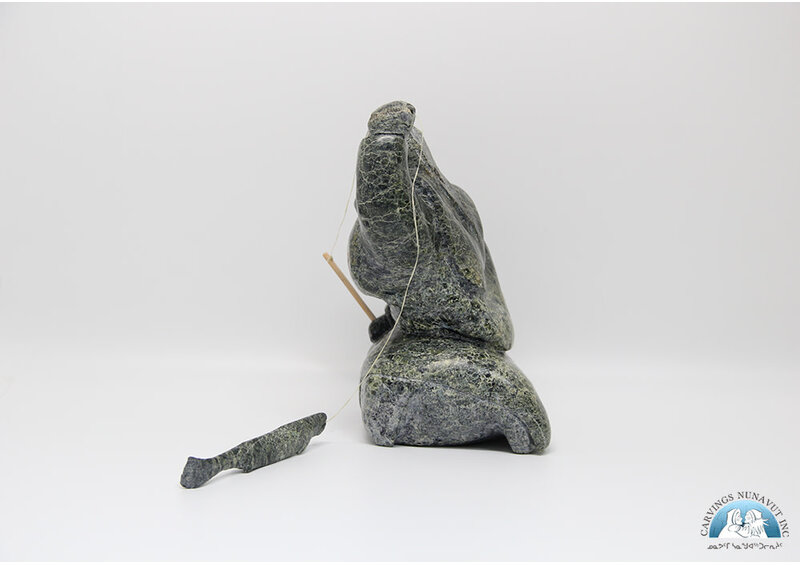 7924 Woman fishing by Archie Ishulutak