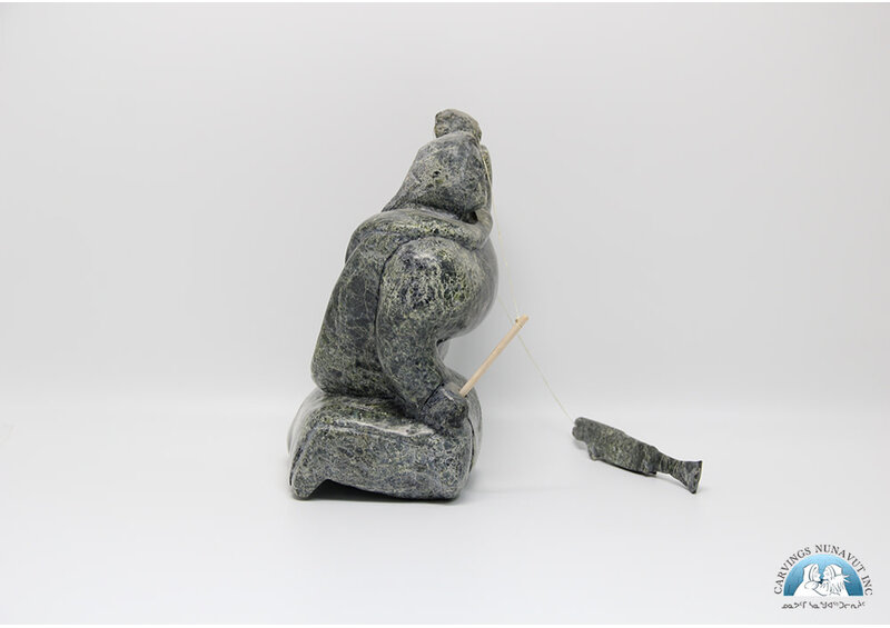 7924 Woman fishing by Archie Ishulutak