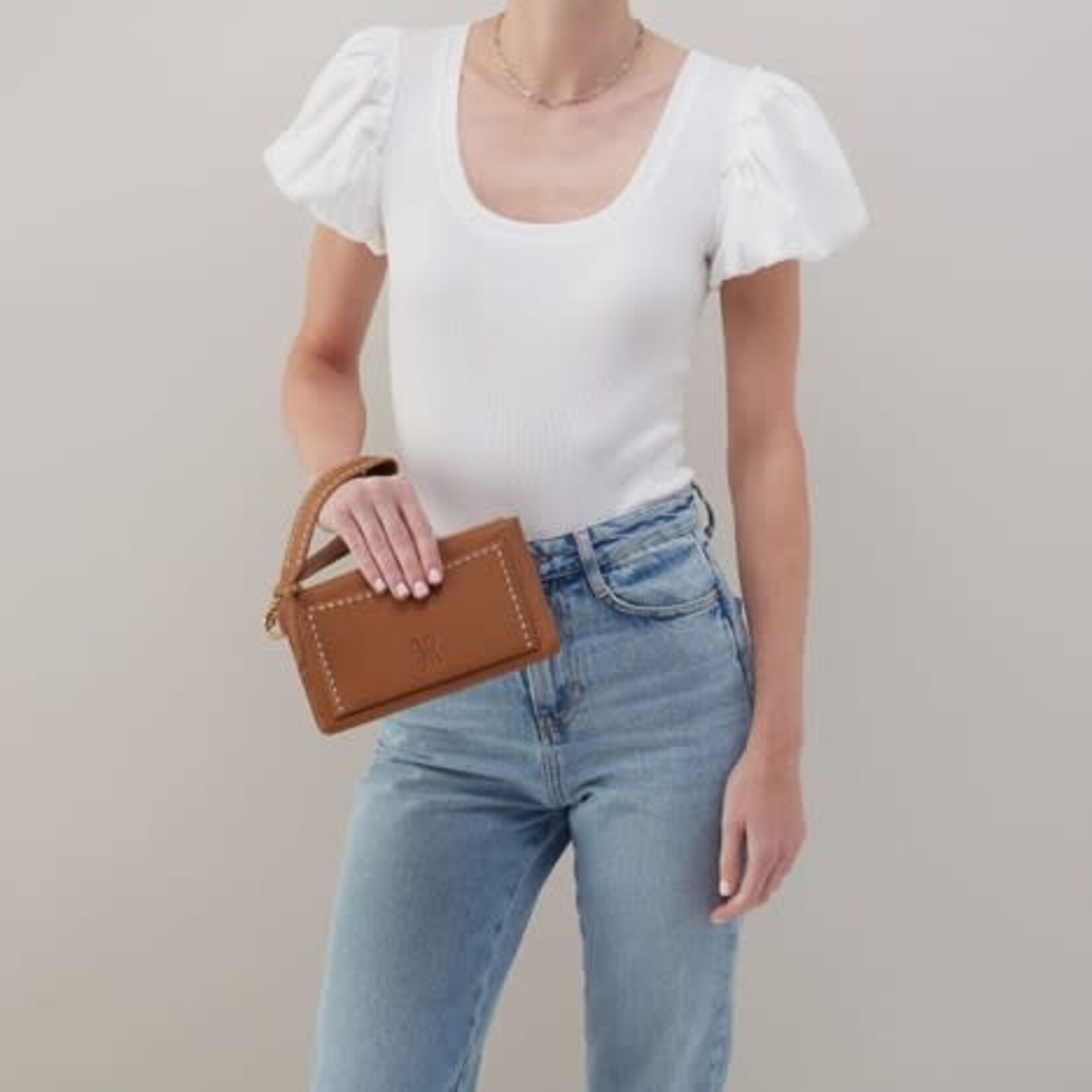 HOBO Hart Pebbled Leather Wristlet in Warm Honey