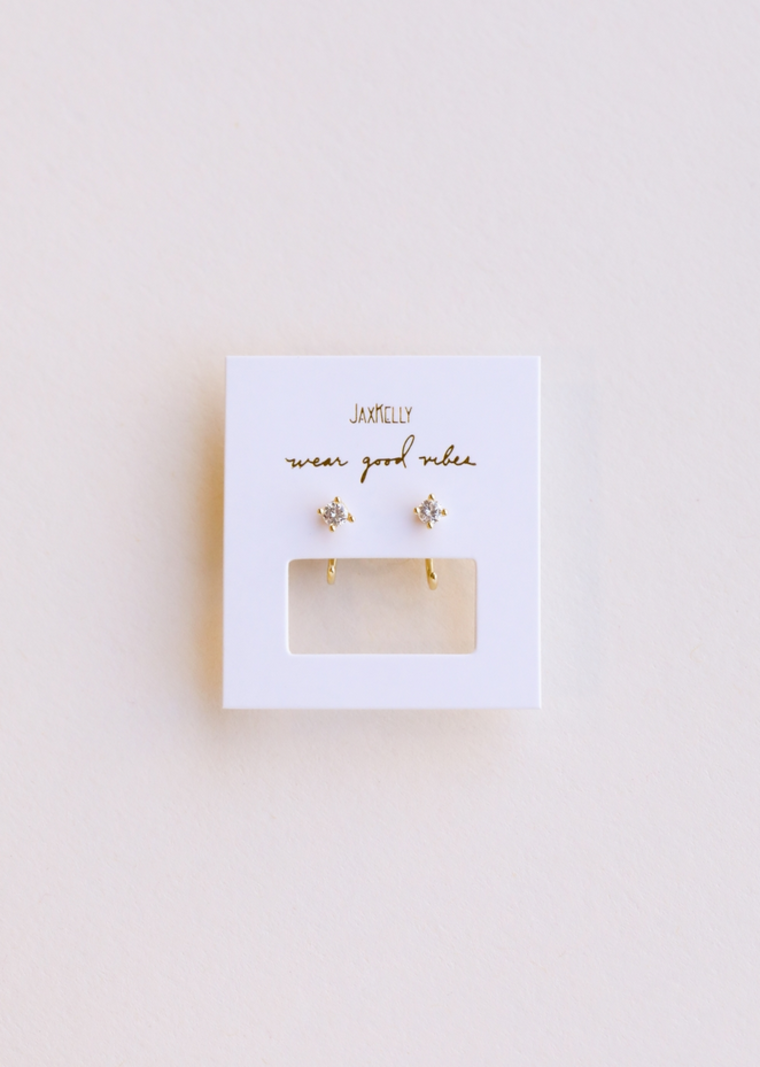 JaxKelly White CZ Huggie Earrings