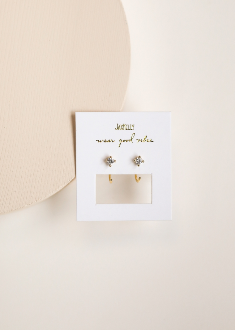 JaxKelly White CZ Huggie Earrings