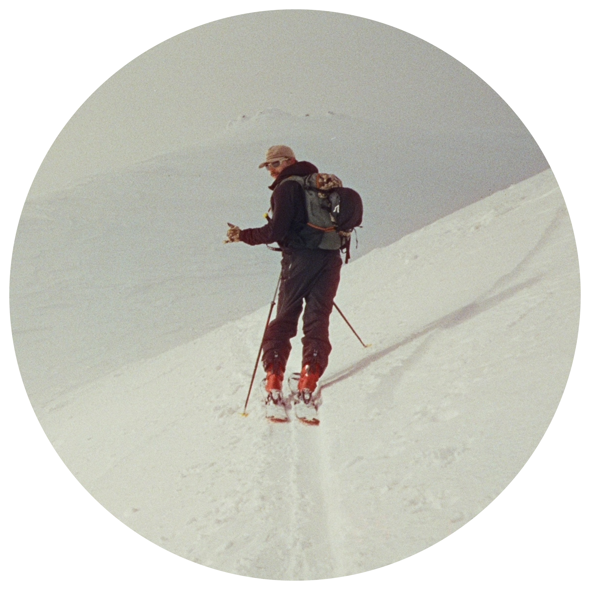 Man skinning up a backcountry trail