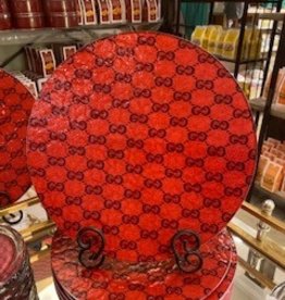 Red background with Navy Gucci Cutting Board