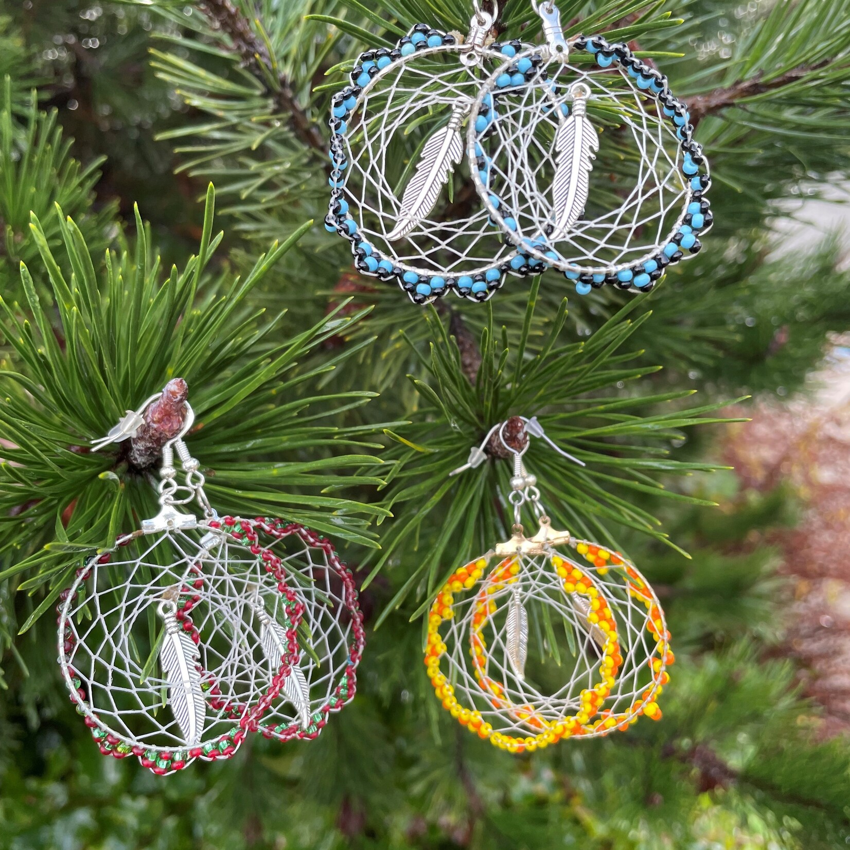 Elizabeth George earrings dream catcher