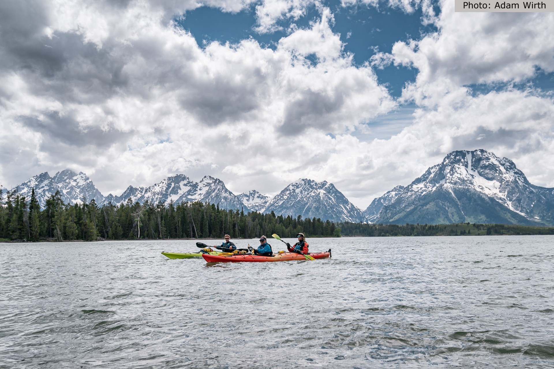Kayaks with the tetons in view