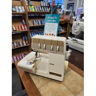 Singer Previously Owned White Serger