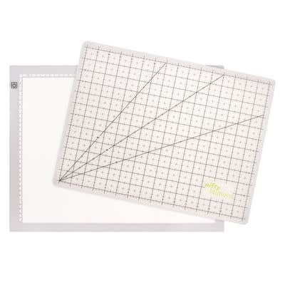 Nifty Notions Nifty Notions Trace & Trim Studio Lightbox is an ultra-thin LED light box combined with a cutting mat