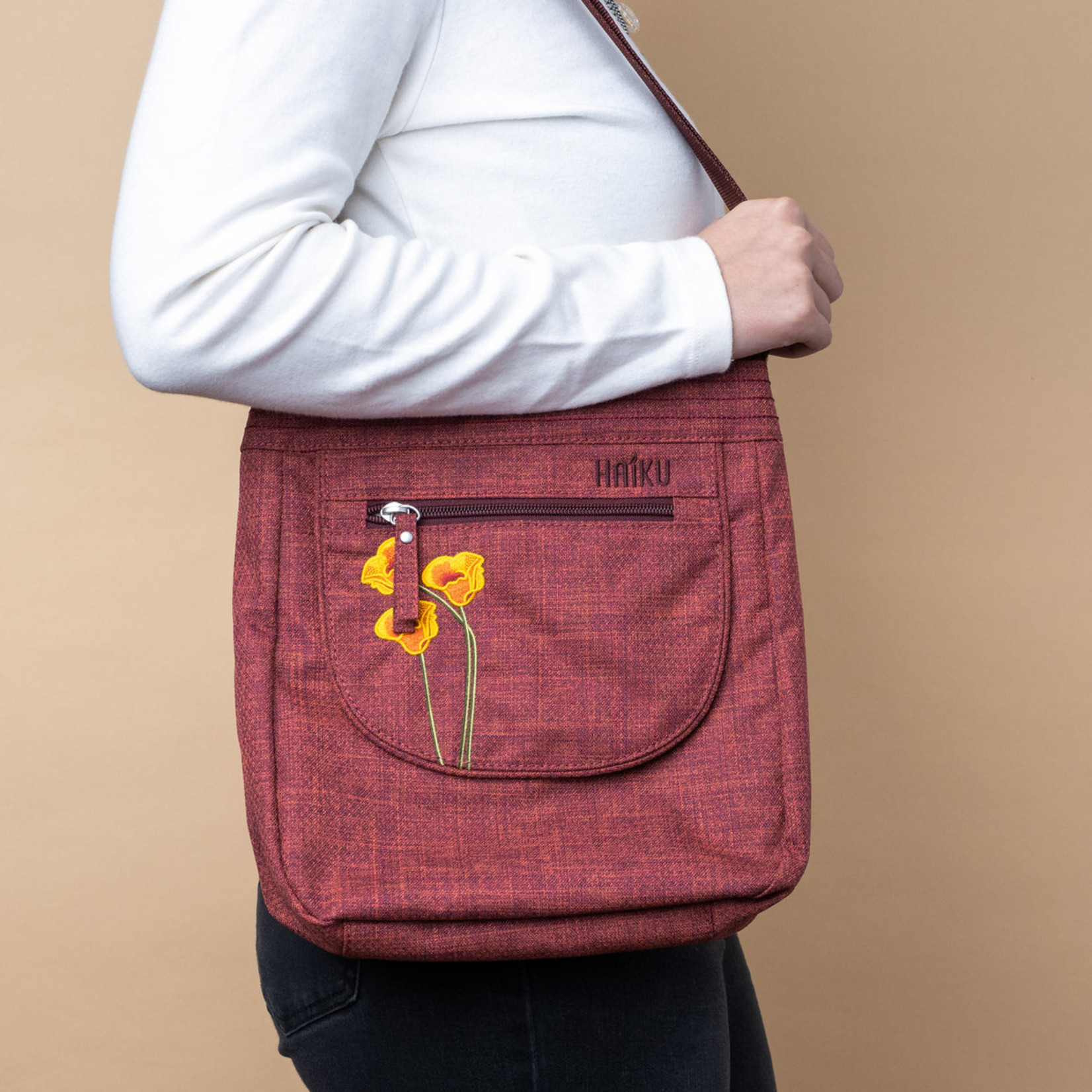 Haiku canvas crossbody bag hotsell