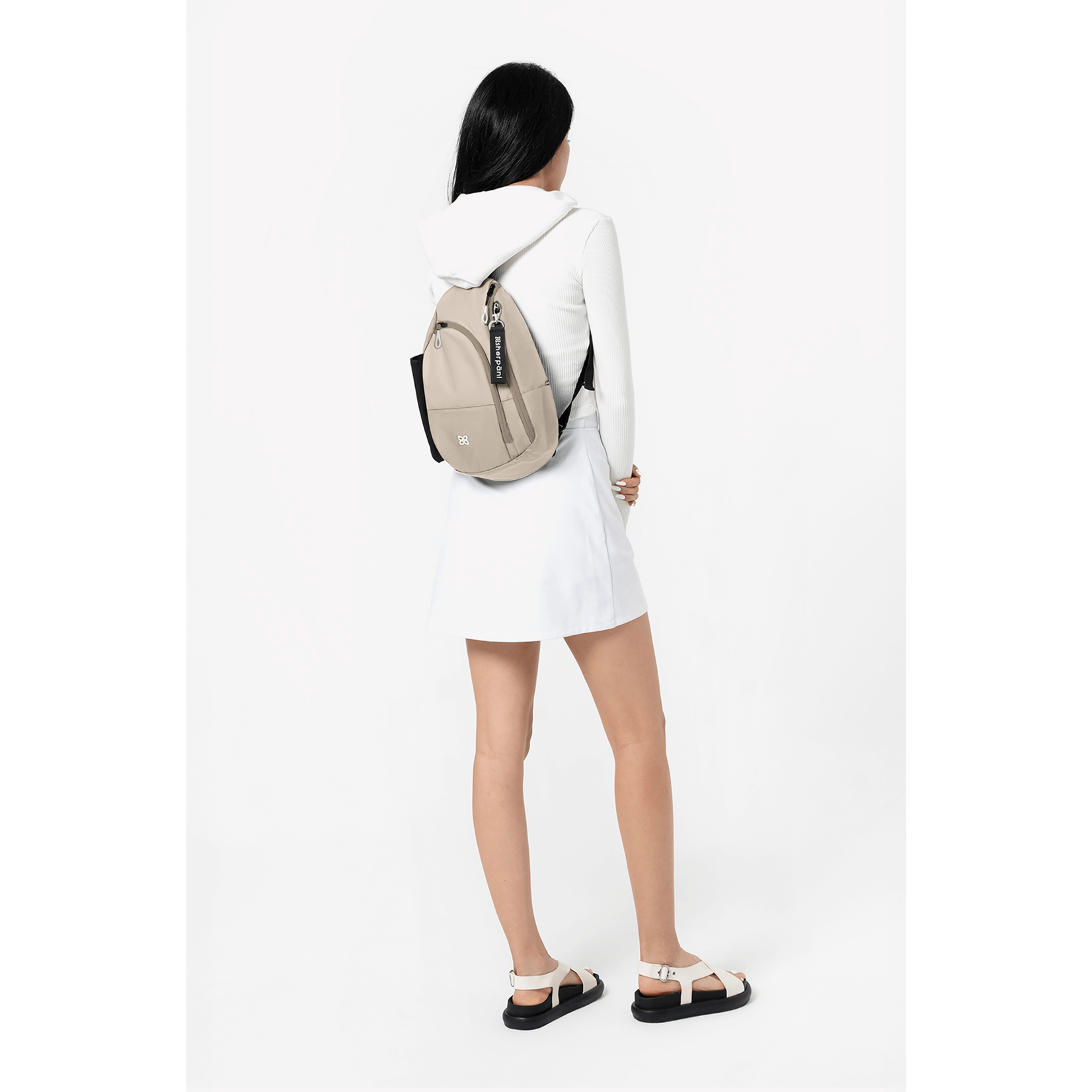 Sherpani Wayfarer Sling Backpack - Con Leche FW25