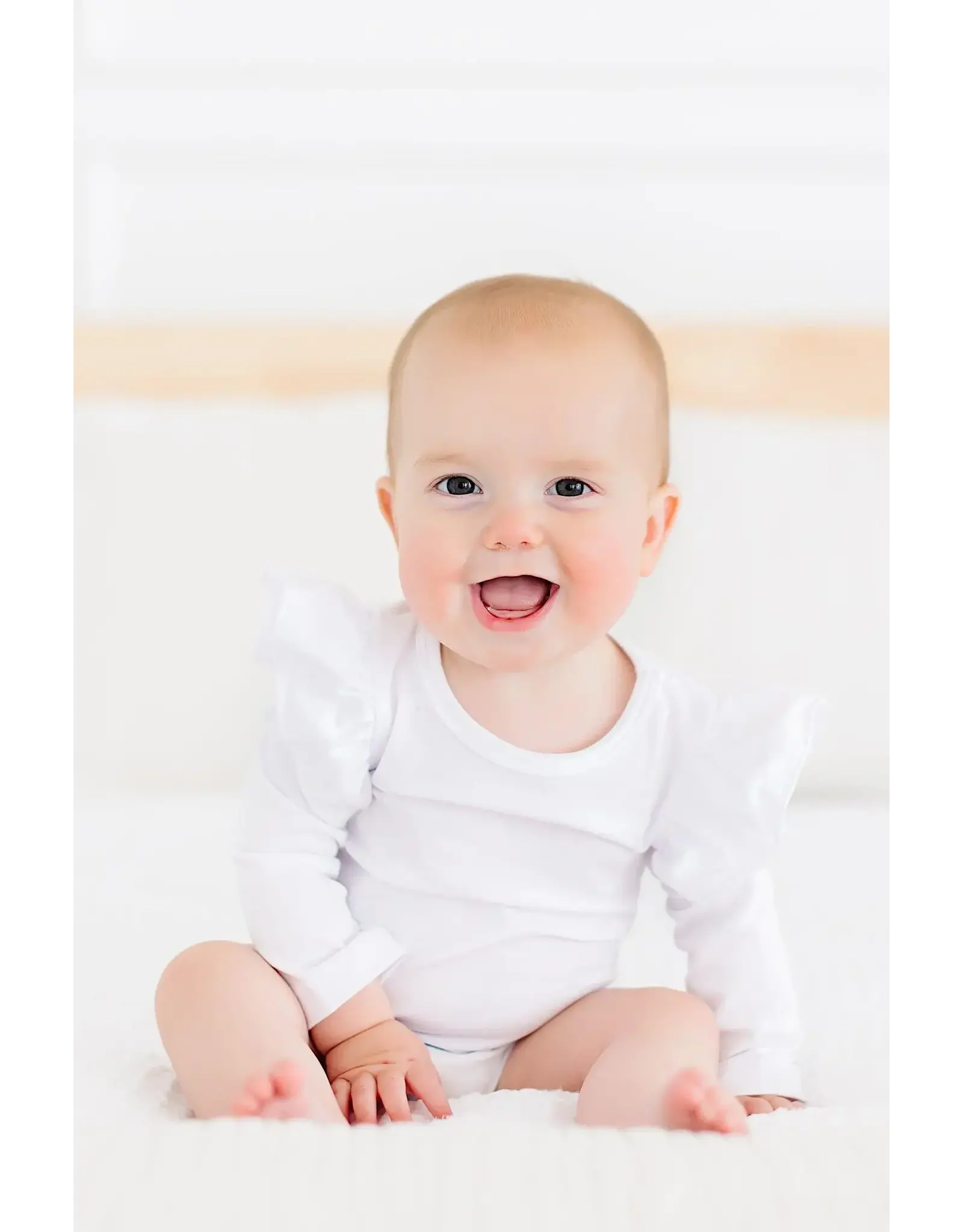 Mila & Rose Mila & Rose- White L/S Flutter Bodysuit