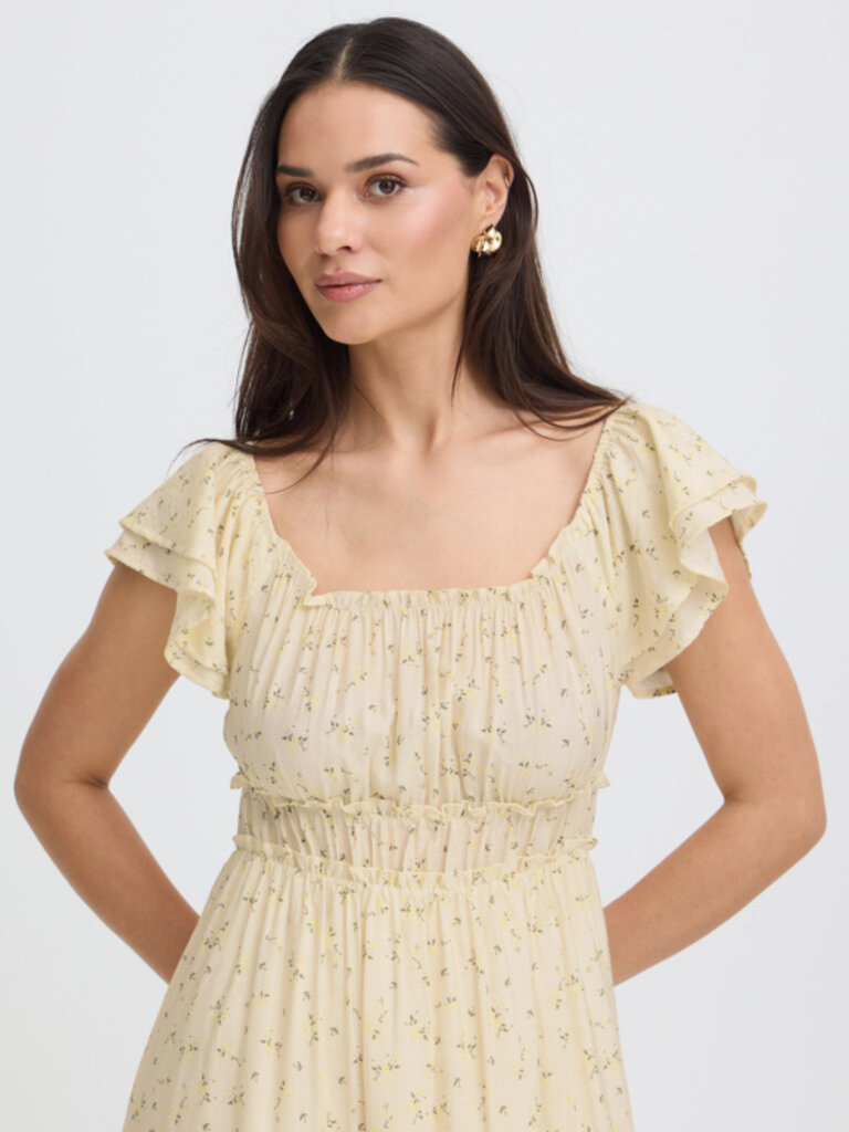 B. Young Soft Yellow Floral Dress