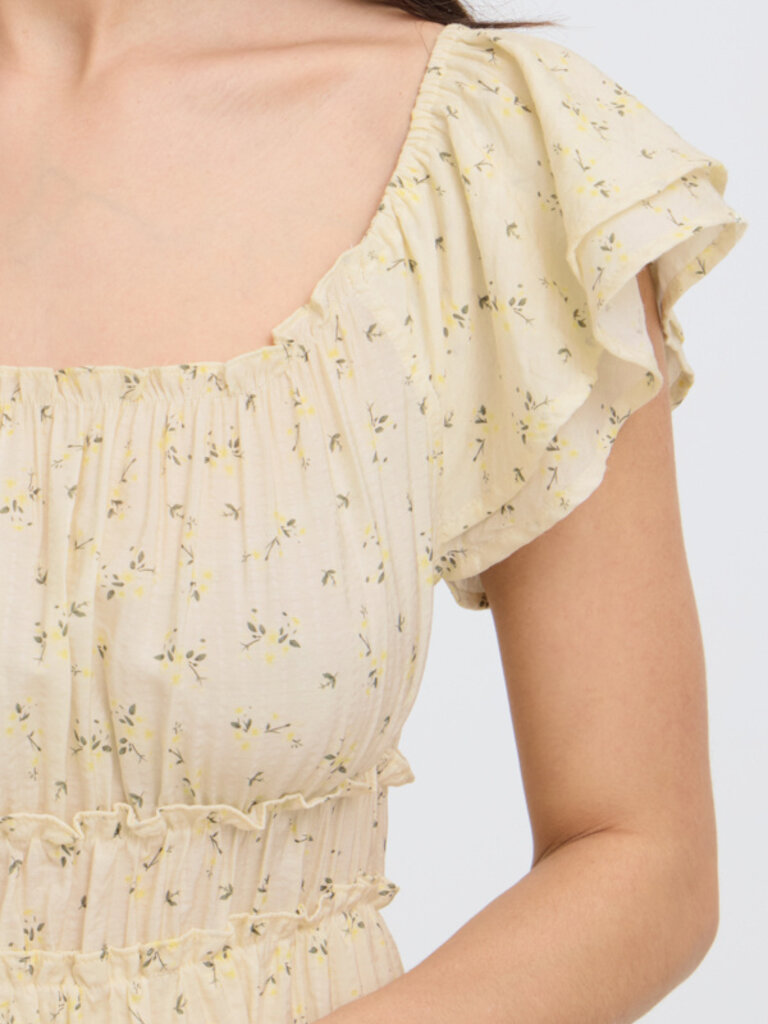 B. Young Soft Yellow Floral Dress
