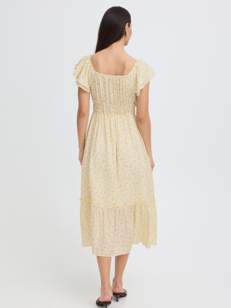 B. Young Soft Yellow Floral Dress