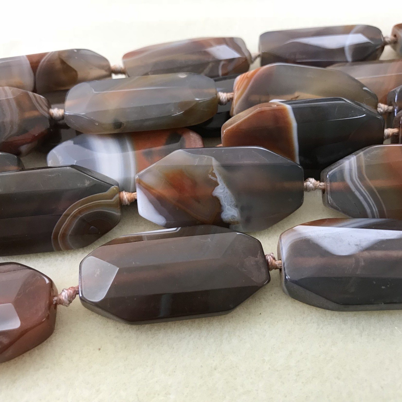 Brazilian AGATE 42x22mm Faceted Oval 1/2 Strand