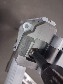 Depressing the ASG CZ Scorpion EVO 3 A1 spring guide with a T40 Torx driver