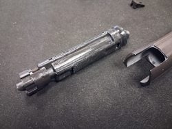 MWS nozzle, fake gas key and spring removed from the bolt carrier group