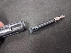 Removing the MWS nozzle spring set