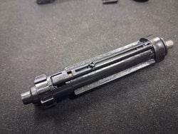 MWS nozzle spring set positioned for the retention screw