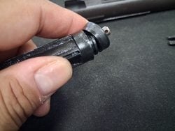 Reinstalling the piston head on the MWS nozzle