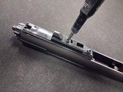 Securing the reassembled MWS bolt carrier group