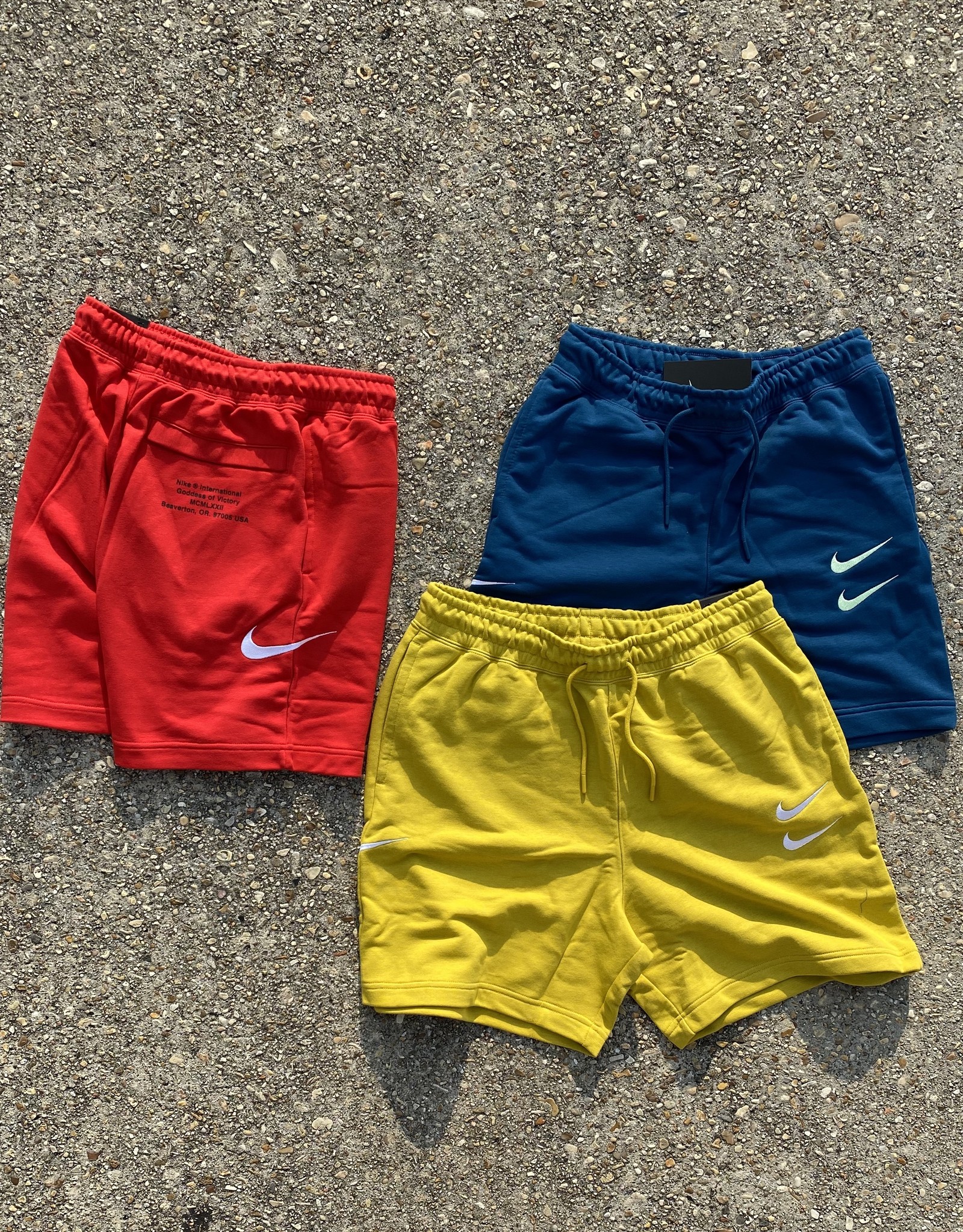 nike mini swoosh cargo shorts in black