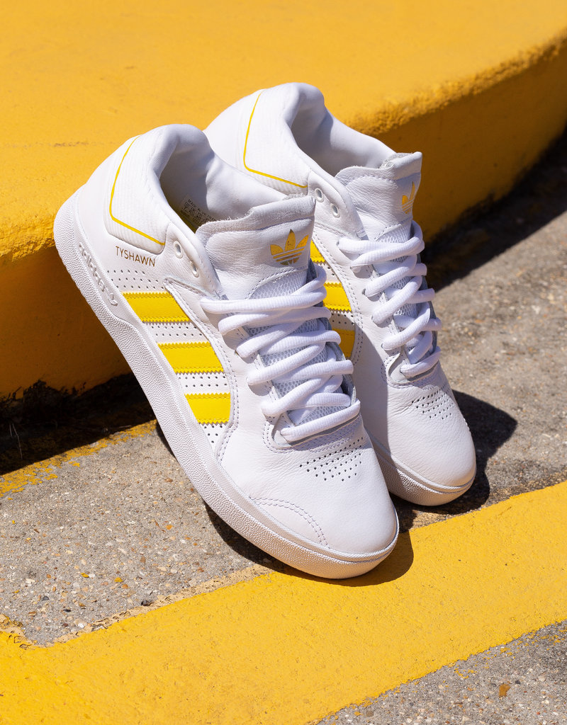 yellow and white adidas