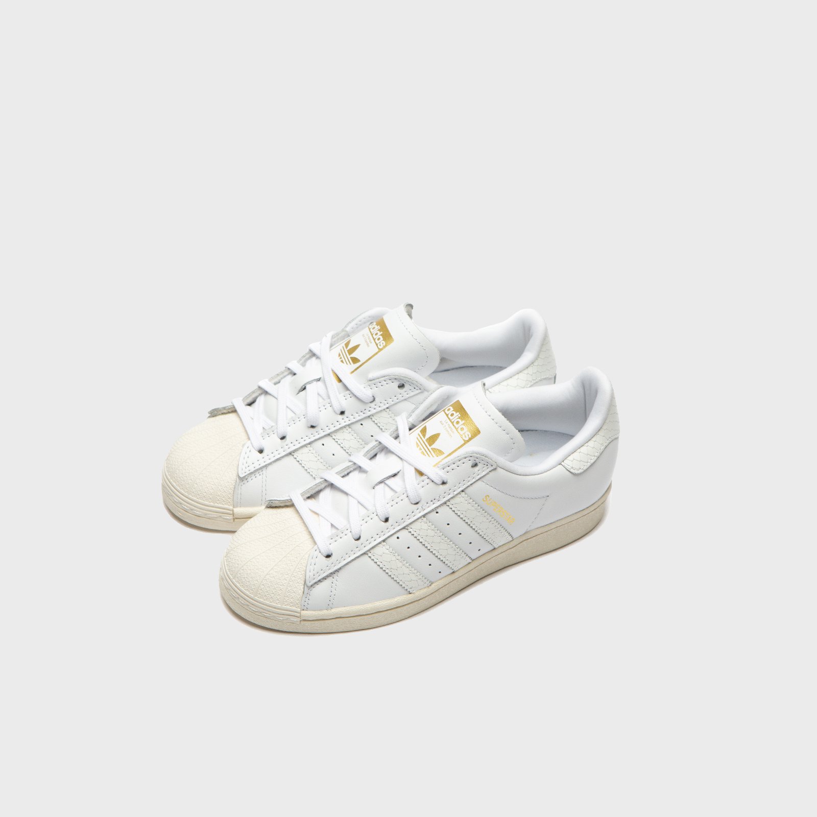 White and gold adidas clearance superstar