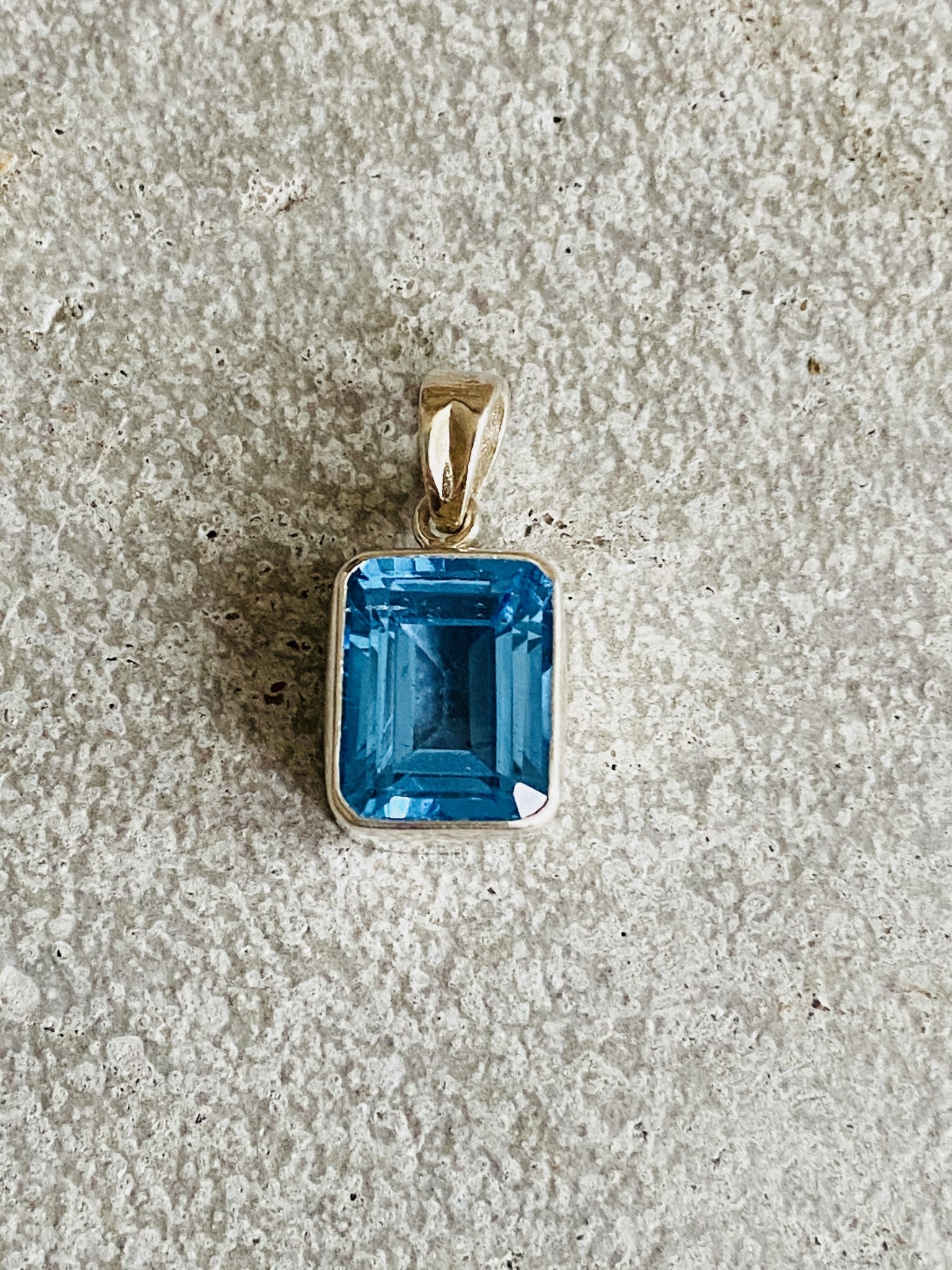 Emerald Cut Blue Topaz Pendant - Silver 
