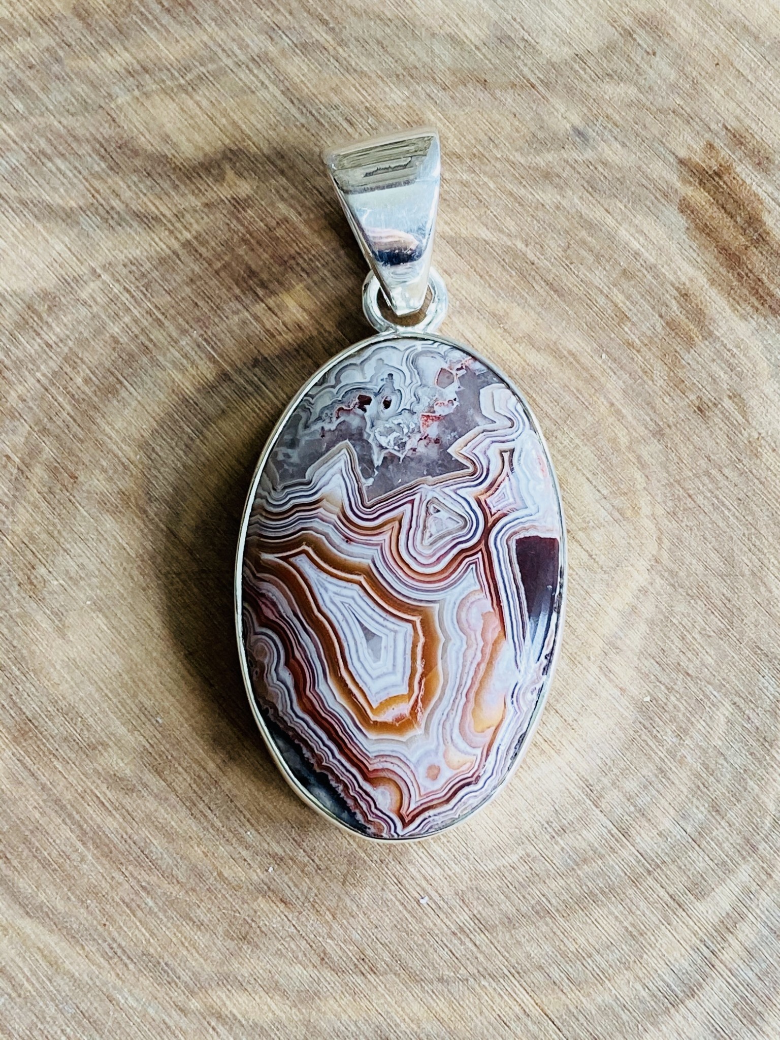 Crazy Lace Agate Oval Sterling Pendant