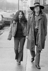 Gruen Yoko Ono and John Lennon wearing a floppy hat, Central Park West, NYC 1973 by Bob Gruen