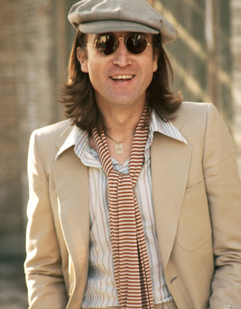 Gruen John Lennon wearing a beige suit, Untermyer Park, Yonkers, NY 1975 by Bob Gruen