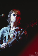 Gruen John Lennon on stage at The One To One concert, MSG, NYC 1972 by Bob Gruen