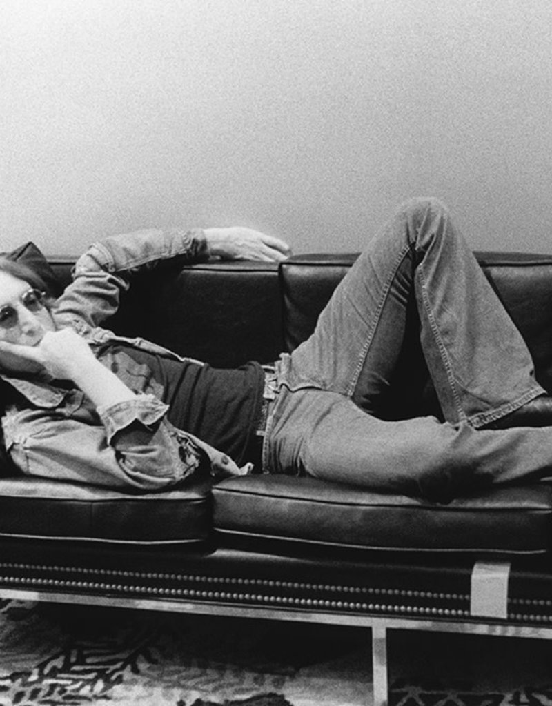 Gruen John Lennon on couch at The Record Plant, NYC 1974 by Bob Gruen