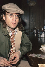 Gruen John Lennon sitting at cafe in Yonkers, NYC 1975 by Bob Gruen