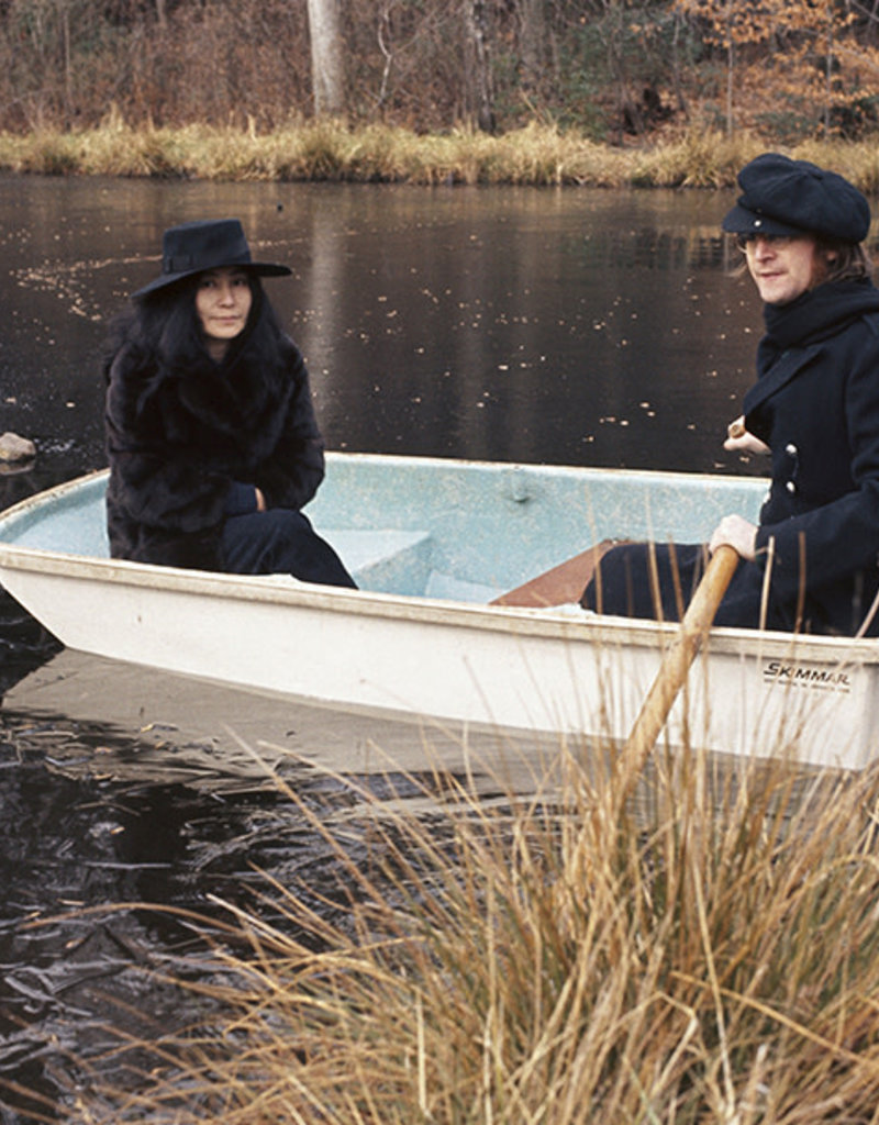 Gruen Yoko Ono and John Lennon in a row boat, Greenwich, CT 1973 by Bob Gruen