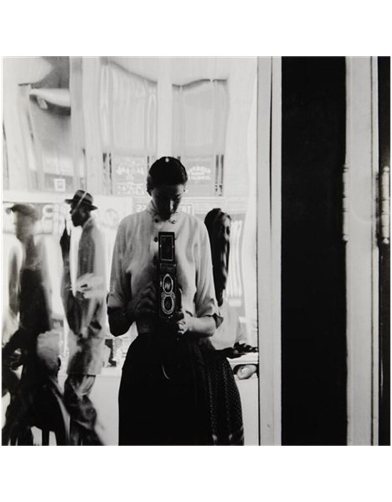 Arnold USA. New York City. 42nd Street. Self-portrait. Eve ARNOLD in a distorting mirror. 1950 by Eve Arnold