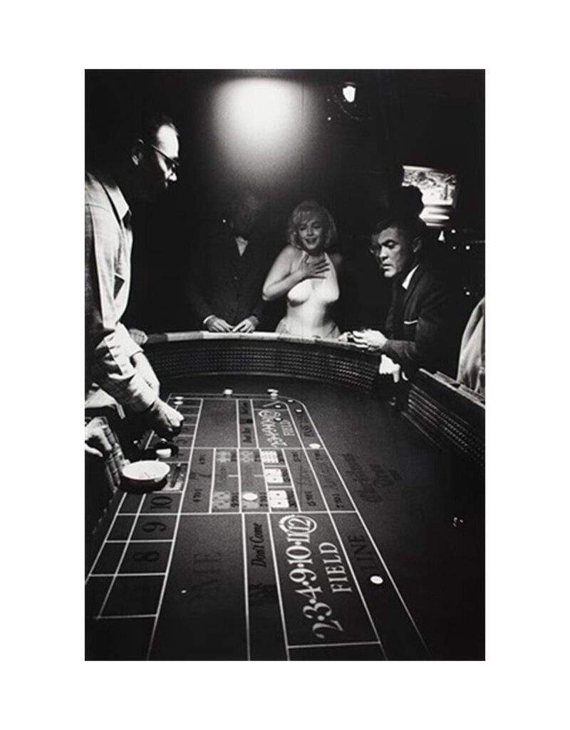 Arnold USA. Nevada. Reno. Marilyn's reaction to a lucky toss. Marilyn Monroe and John Huston. 1960 by Eve Arnold