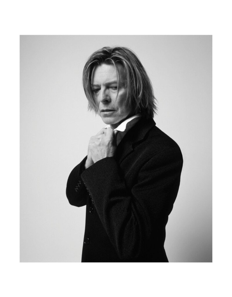 Rock Bowie in Black Jacket Looking Down NYC 2002  by Mick Rock
