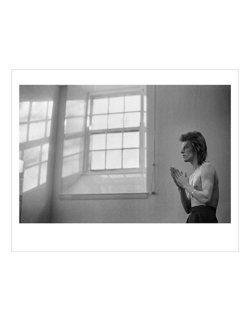 Rock Bowie Praying By Windows, Scotland 1973  by Mick Rock