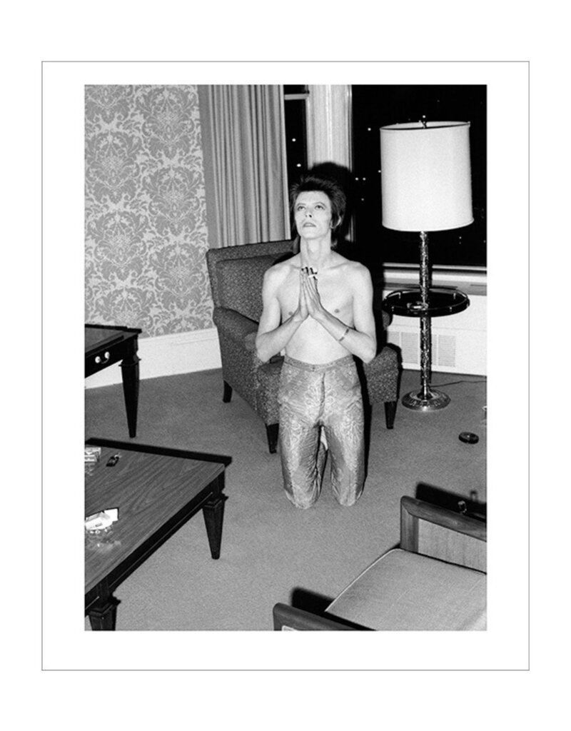 Rock Bowie Praying on Knees, Chicago 1972  by Mick Rock
