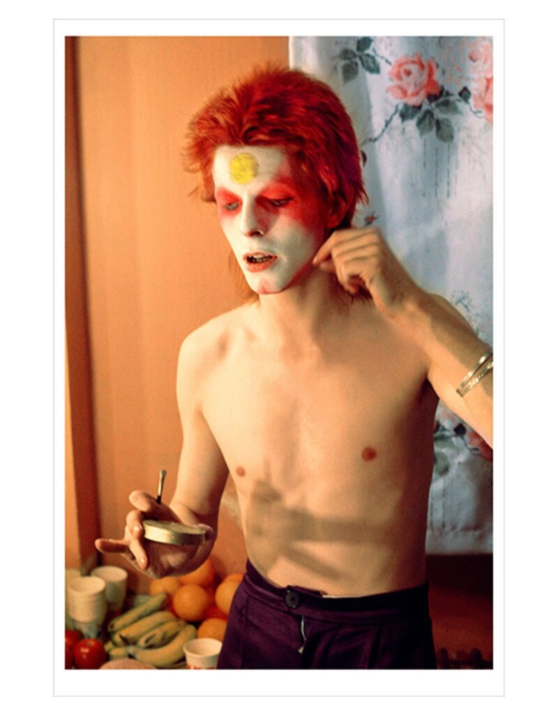 Rock Bowie Pulling Of Mask, UK 1973  by Mick Rock