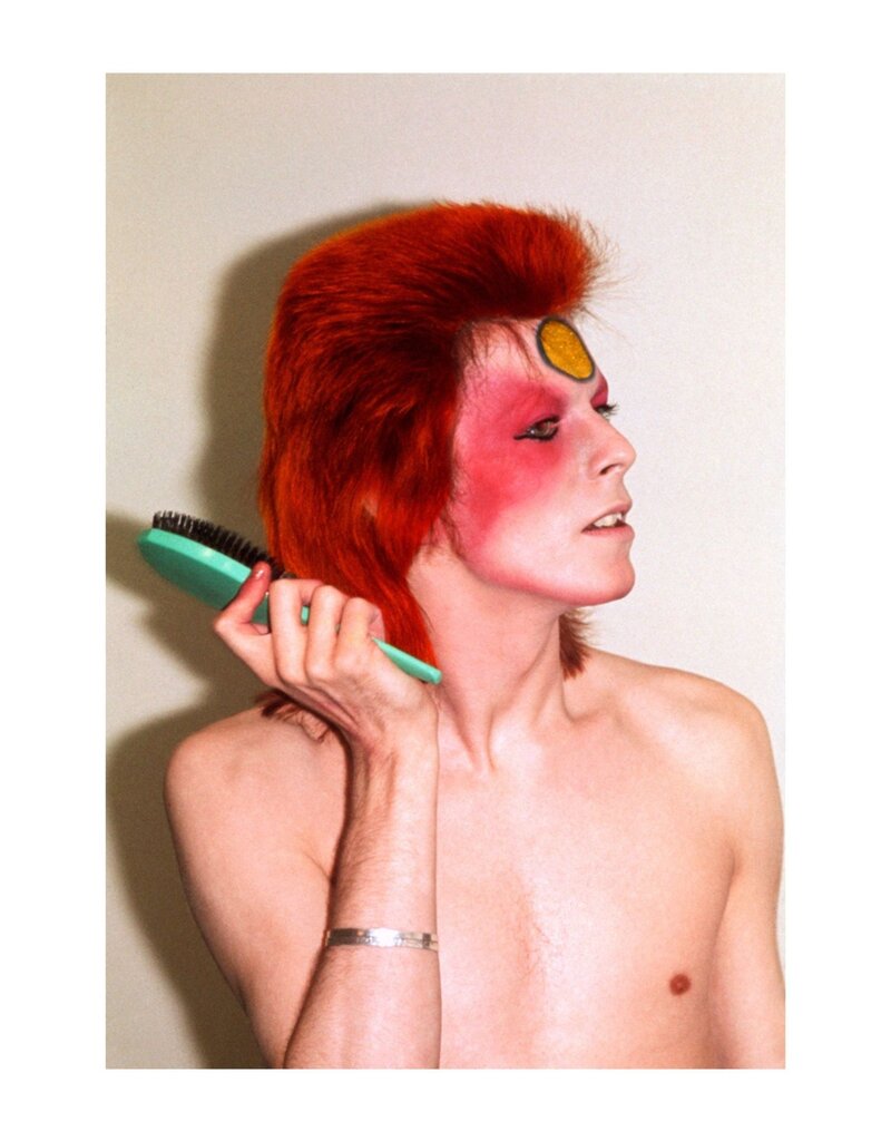 Rock Bowie With HairBrush, UK Summer 1973 by Mick Rock