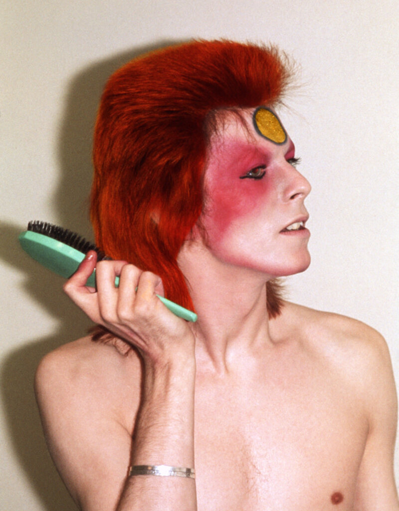 Rock Bowie With HairBrush, UK Summer 1973 by Mick Rock