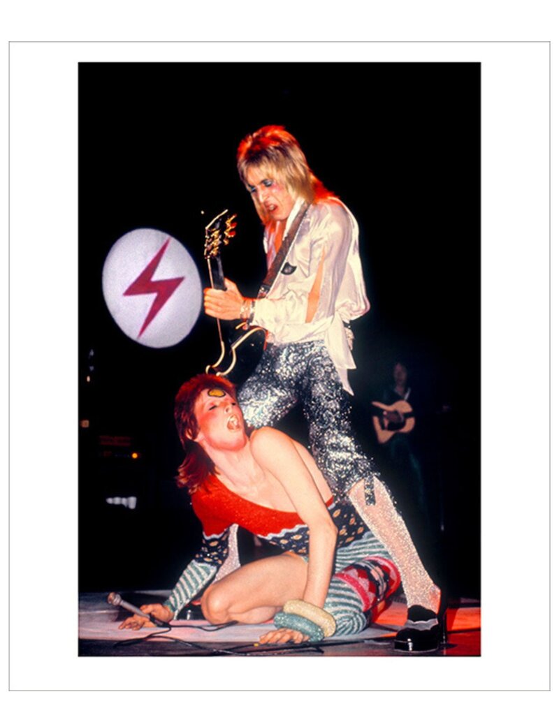 Rock Ronson Straddling Bowie, UK 1973 by Mick Rock